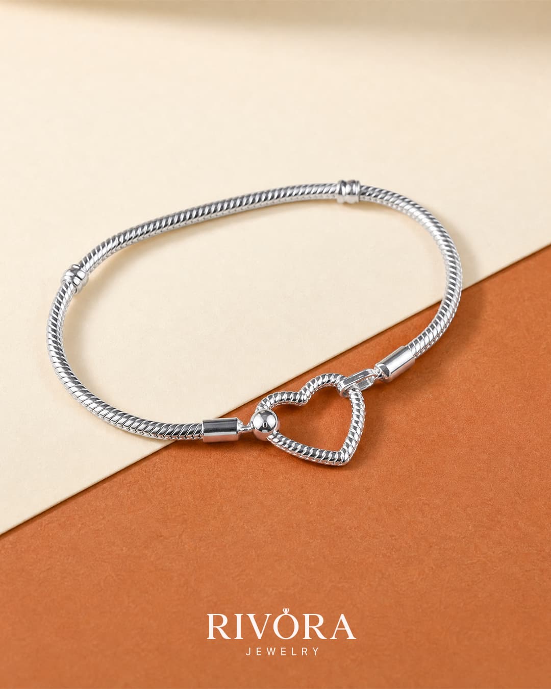 THE HEART OF RIVORA BRACELET  ( SILVER )